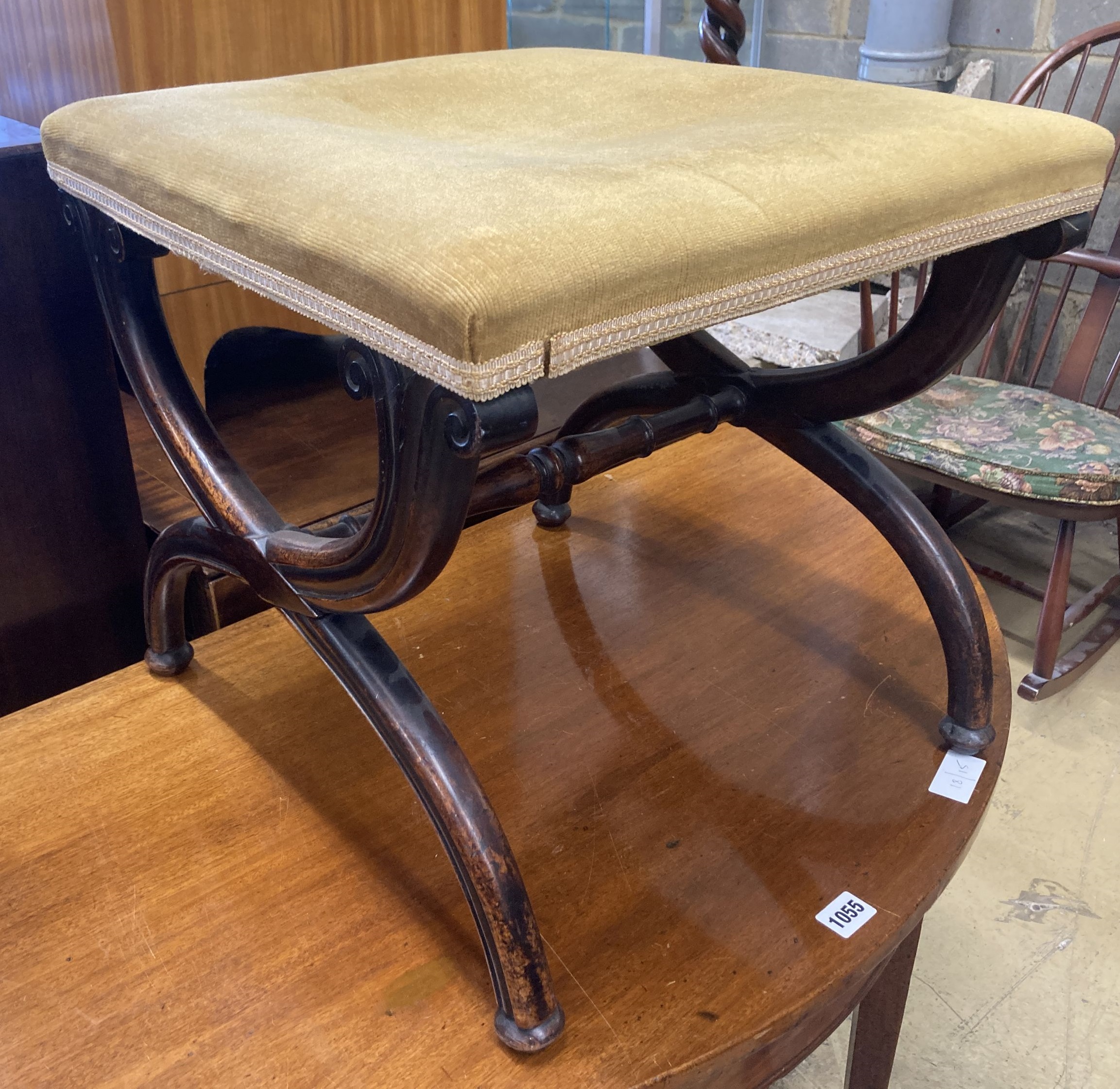 An early Victorian mahogany X frame dressing stool, length 45cm, depth 42cm, height 41cm
